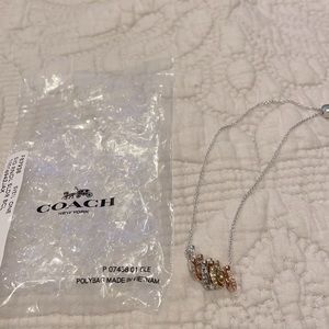New! Coach slider bracelet. Multi color “C’s”